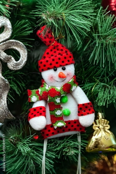 Obraz Christmas toys on an artificial Christmas tree close-up