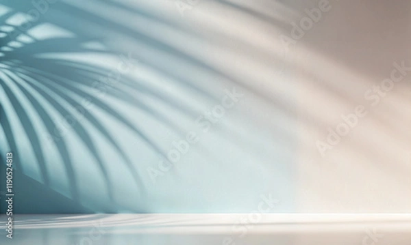 Obraz Minimalist simple background for design with beautiful light shadow from palm leaves on wall, gentle calm pastel muted shades of blue and beige with smooth color transition.