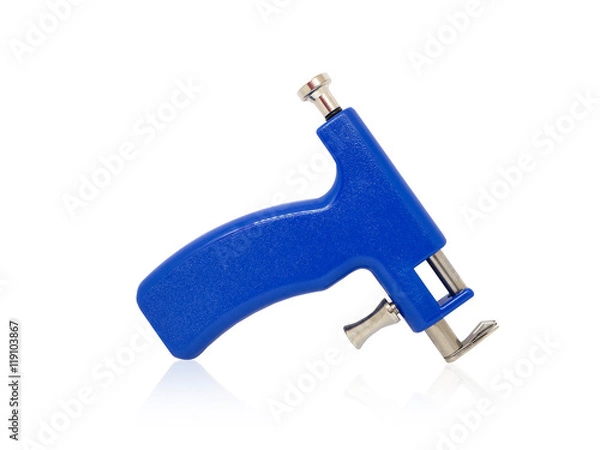 Obraz Ear piercing gun on white background

