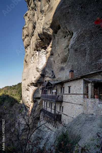 Fototapeta Monastery of St. Anthony carved into the cliffs of Meteora, Greece. A serene symbol of spirituality and ancient architecture