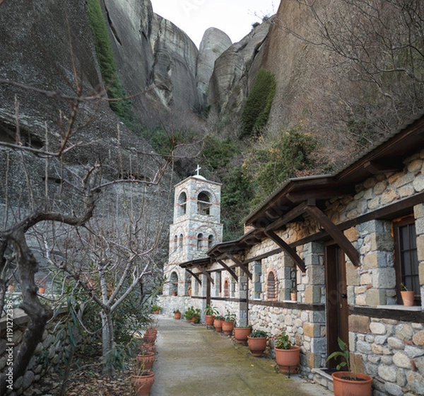 Fototapeta Monastery of St. Anthony carved into the cliffs of Meteora, Greece. A serene symbol of spirituality and ancient architecture