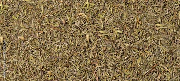Fototapeta Dry thyme texture, dried marjoram pattern, oregano pile background, ground crushed thyme seasoning mockup