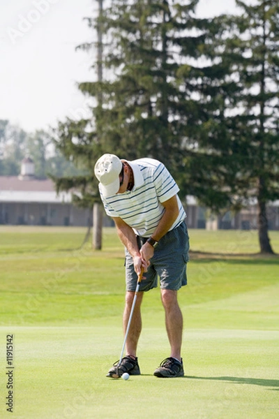 Fototapeta Man Playing Golf