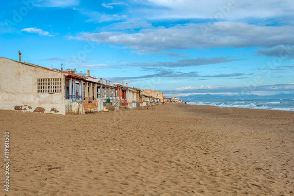 Fototapeta VIEW IN FRONT OF HOUSES ON THE BEACH IN THE CENTER OF GUARDAMAR DEL SEGURA, SPAIN