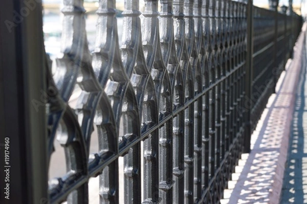 Obraz Wought iron fence with repeating pattern