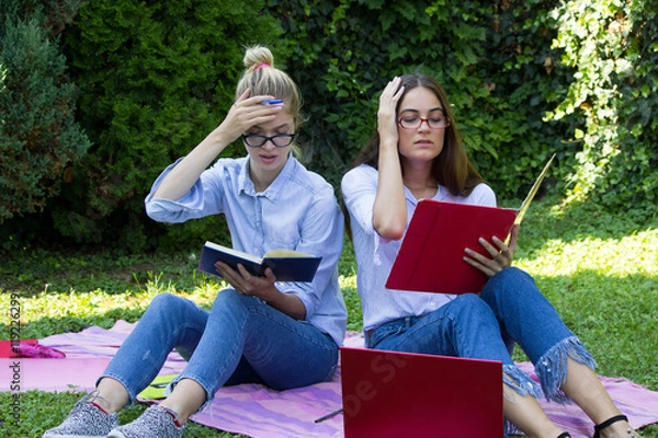 Fototapeta girls have problem with learning