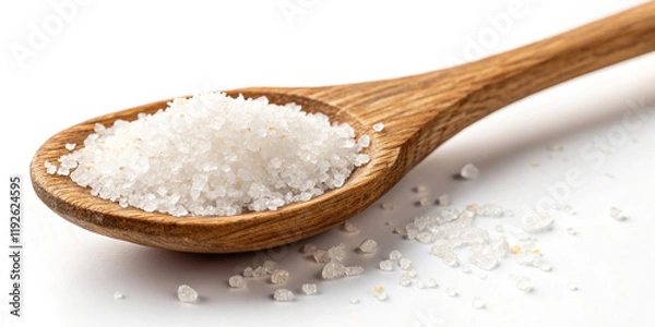 Fototapeta A Close-Up View of a Wooden Spoon with Salt Isolated on a White Background