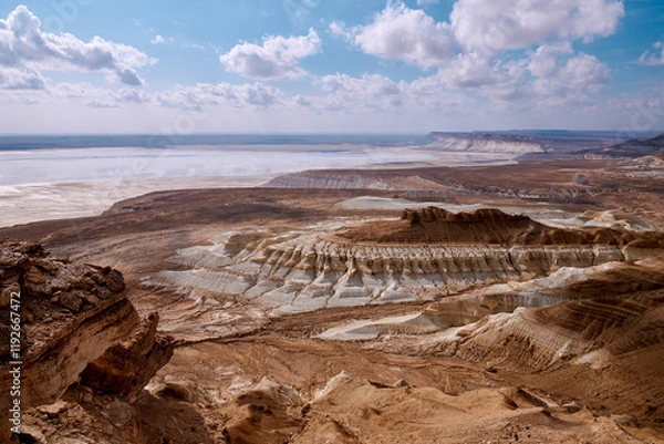 Fototapeta On the Ustyurt Plateau. Here, the Ustyurt Cliff steeply breaks by a cascade of clay-limestone and chalk steps, at the bottom of which lies a vast salt marsh, called in this region, Tuzbair.
