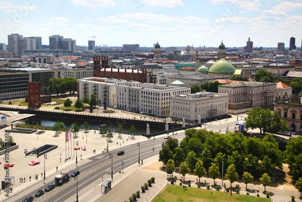 Obraz Berlin, Germany - July 9, 2024: View of central Berlin from the Berlin Cathedral, with Museum Island, the Spree River, and iconic city landmarks under a clear summer sky.