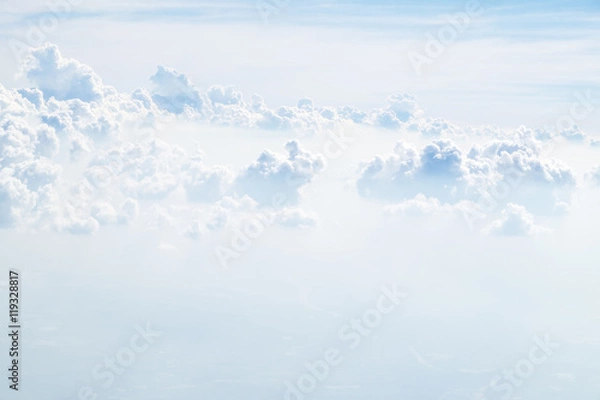 Fototapeta Aerial view of cloud and sky from airplane,Traveling concept