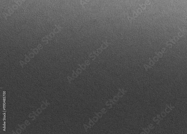 Fototapeta Charcoal gray paper background with a gradient matte texture and subtle grainy details. Dark neutral tones create a refined, stylish, and sophisticated design with a seamless, modern composition.