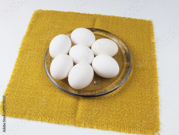 Obraz Eier auf dem Glasteller