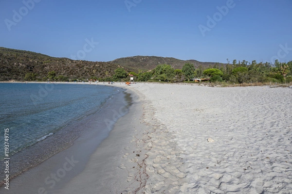 Fototapeta The beautiful white beach of Cala Pira in Castadias with its transparent and turquoise water