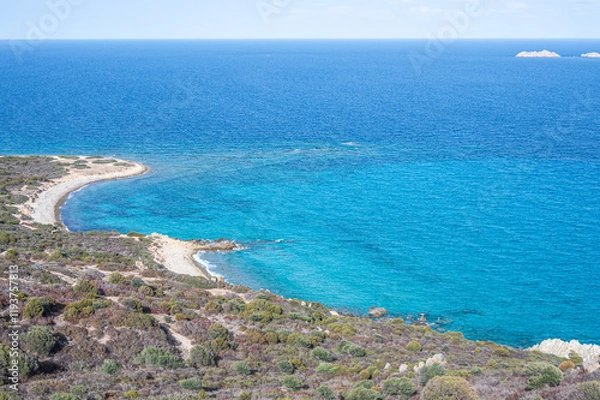 Fototapeta Aerial view of the small beaches on the coast of Castiadas in Sardinia with transparent, blue and turquoise water