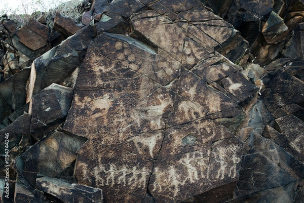 Fototapeta Petroglyphs in Tamgaly. Tamgaly is a petroglyph site in the Almaty region of Kazakhstan. Tamgaly became a UNESCO World Heritage Site in 2004. Tamgaly is located 170 km  northwest of Almaty.