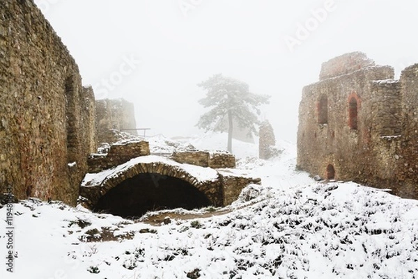Fototapeta Upper courtyard of castle ruins in winter. Stary Jicin. Moravia. Czechia.