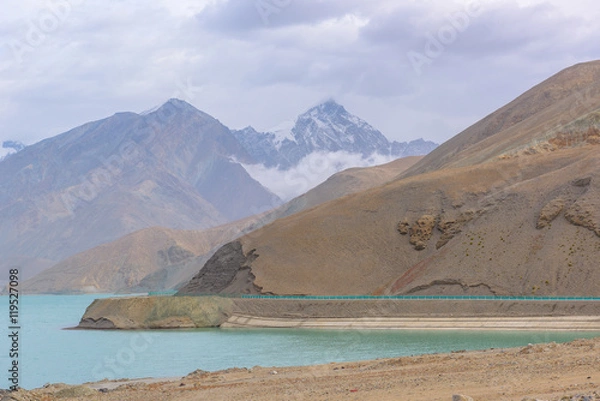 Fototapeta Mount Muztag Ata, the father of ice mountains, and the Karakul Lake, on the Pamirs Plateau, Taxkorgan, Kashgar, Xinjiang, China