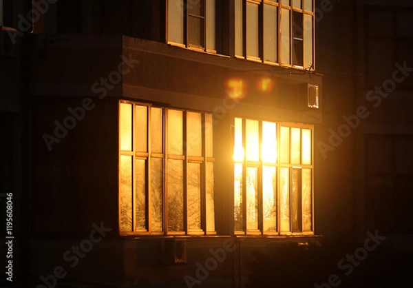 Obraz Photo Evening sunlight in the windows