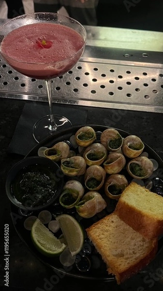 Fototapeta Snails with sauce and cocktail