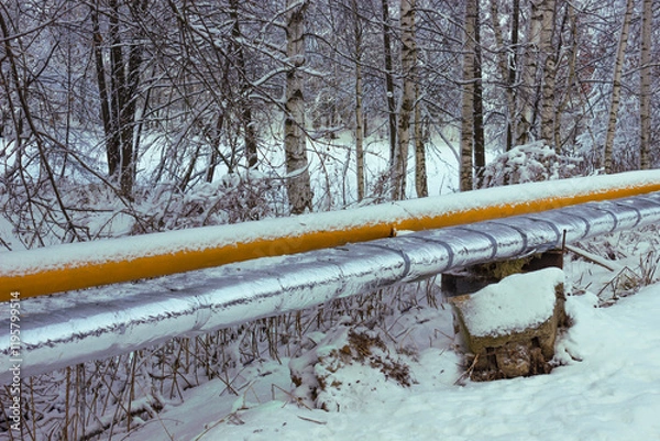 Fototapeta Water supply system supplying village is covered with thermal insulation, frost protection