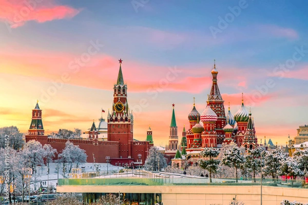 Obraz View of Kremlin and St. Basil Cathedral at the Red Square during sunset in winter. Famous landmarks in Moscow, Russia