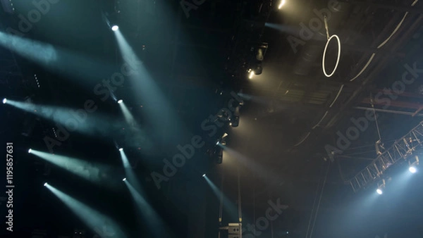 Fototapeta The ceiling of the film studio with many lighting fixtures installed on the farm at the theater or concert hall. Professional lighting equipment. Ring or hoop for gymnastic exercises