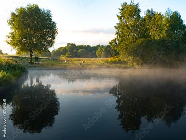 Fototapeta Sunrise over a meadow