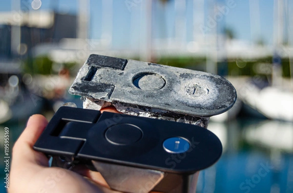 Obraz Two locks for the sailing yacht's lockers. One is old, and one is new as a replacement