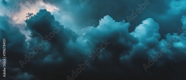 Fototapeta Dark clouds create a dramatic atmosphere with ominous textures against a black backdrop