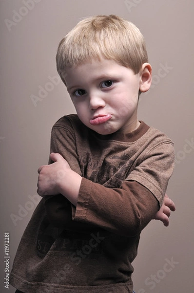 Fototapeta Pouting little boy