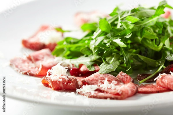 Fototapeta Meat Carpaccio with Rocket Salad