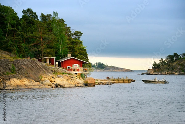 Fototapeta Helsinki, Finland. Summer house sauna with boat landing on coast on east side of Helsinki