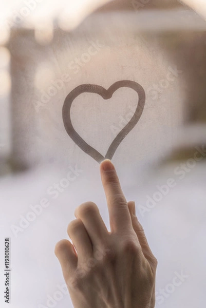 Obraz Heart on a glass of a window and a finger , tender scene, touching moment