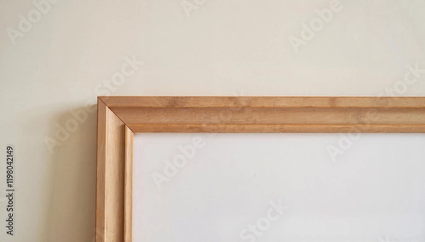 Fototapeta Close-up of intricate wooden frame corners against plain wall, texture art