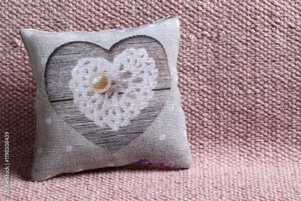 Obraz Cushion with heart on sofa
