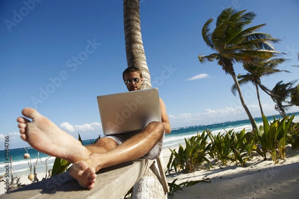 Obraz Man Working on Beach