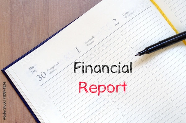 Fototapeta Financial report text concept on notebook
