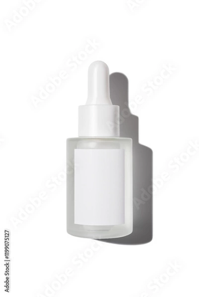 Fototapeta Minimalist glass dropper bottle with blank label isolated on white background