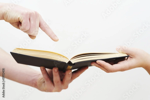 Obraz hands and book