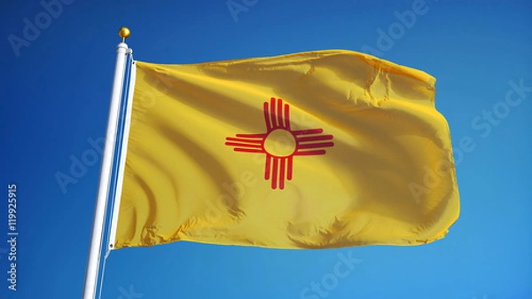 Obraz New Mexico flag waving against clean blue sky, close up, isolated with clipping path mask alpha channel transparency