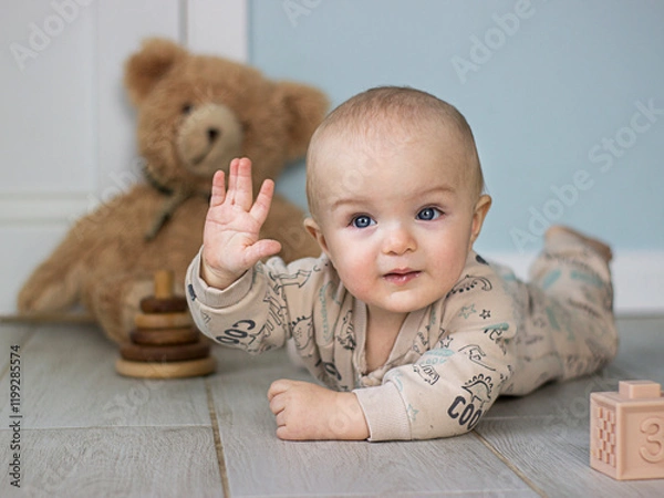 Obraz A small child playing with toys