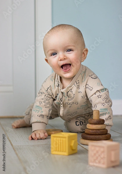 Obraz A small child playing with toys