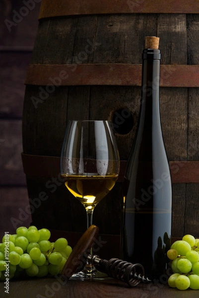 Fototapeta Glass of wine, cheeses and grapes on old wooden table. dark background.