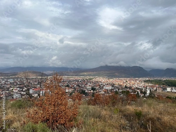 Fototapeta View of Podgorica on a cloudy day after rain. High quality photo