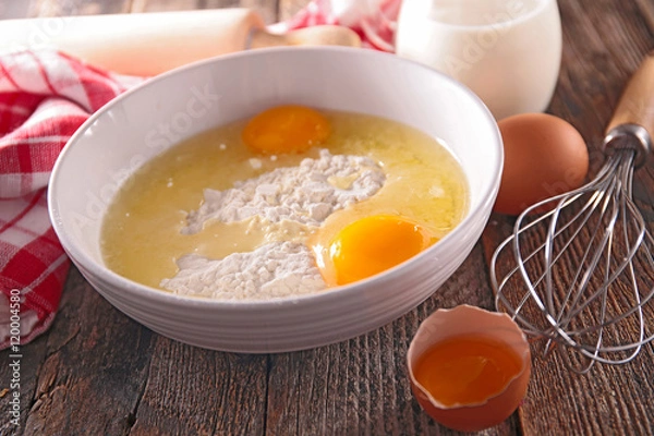 Fototapeta bowl with flour and egg