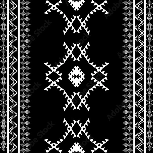 Fototapeta The geometric ethnic pattern of traditional style. Navajo, America Indian patterns. Design for background, wallpaper, clothing, wrapping, Batik, fabric, and prints. Vector illustration.