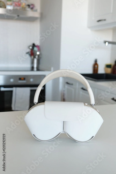 Obraz Modern White Headphones on Kitchen Counter