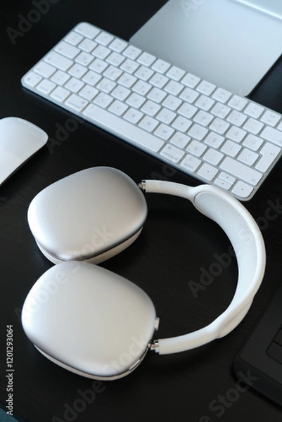 Obraz 2025 Modern Headphones and Keyboard on a Workspace Desk