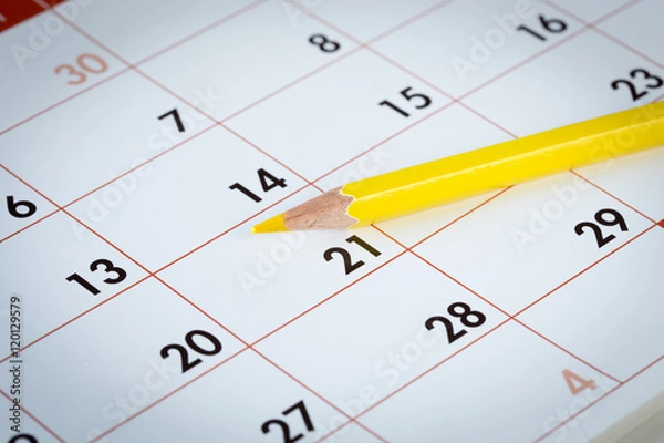 Fototapeta Pastello giallo su calendario