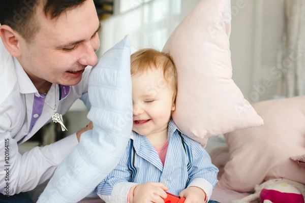 Fototapeta Happy father playing with his wonderful son